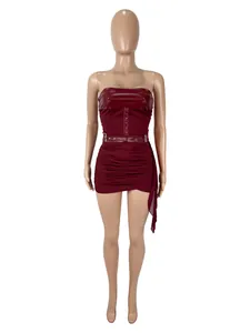 Detailed view of sexy burgundy strapless corset top and ruched leather mini skirt set