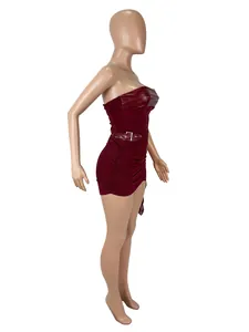 Side view of sexy burgundy tube top and ruched leather skirt set on mannequin