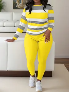 Ensemble deux pièces pour femme avec haut rayé à manches longues et legging jaune vif