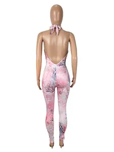 Detailed back view of a sexy pink marble print halter neck slim-fit jumpsuit on mannequin
