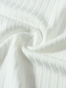 Close-up macro view of the soft white ribbed fabric texture for men's fitness vest top.