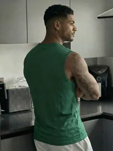 Back view of a green mesh athletic tank top showing breathable fabric and comfort fit.
