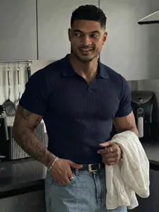 Slim fit men's navy blue ribbed short sleeve polo shirt with V-neckline details