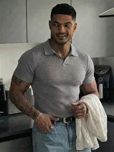 Men's slim-fit grey ribbed polo shirt with casual V-neck design for summer sports.
