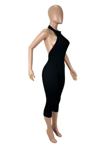 Detailed side view of a sexy black backless tight-fitting jumpsuit shown on a mannequin