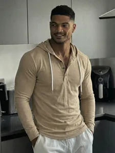 Men's slim-fit long-sleeve hooded Henley shirt in khaki for fitness and casual wear.