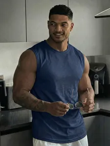 Premium breathable blue mesh tank top for men shown in a modern lifestyle setting