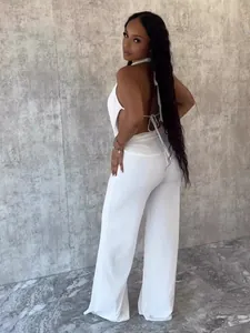 Ensemble deux pièces sexy blanc dos nu avec pantalon large en mesh pour femme élégante