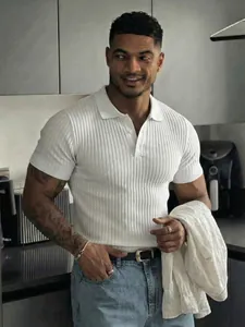 Man in a stylish white ribbed polo shirt showcasing summer casual fashion and slim fit