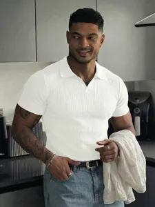 Men's casual white ribbed polo shirt featuring a V-neck and slim fit for summer sports.