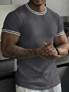 Close-up of a dark grey ribbed slim-fit men's T-shirt with striped trim collar and cuffs