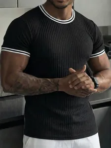 Athletic fit men's black ribbed T-shirt with stylish white contrast trim details