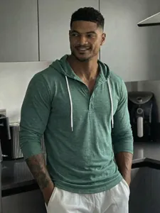Premium men's casual slim fit heather green long sleeve hooded henley shirt for fitness
