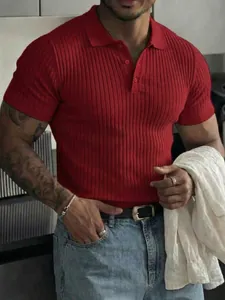 Detailed shot of men's red ribbed knit polo shirt featuring button collar and slim fit