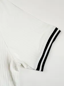 Macro detail shot showing the striped cuff and ribbed fabric of men's white quick-dry T-shirt