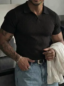 Close-up of men's slim fit black ribbed short sleeve Polo shirt with a V-neckline
