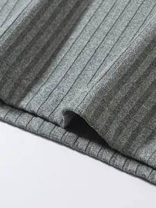 Detailed macro view of gray ribbed knit fabric texture on a men's athletic tank top.