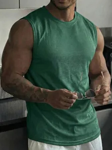 Close-up of green men's mesh sports tank top showing breathable fabric texture
