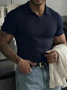 Close-up of a navy blue ribbed knit polo shirt for men in a slim fit style