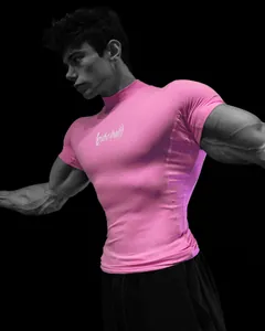 Rosa Kompressions-T-Shirt für Herren mit kurzem Arm und stilisiertem Logo-Detail