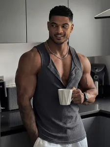 Close-up of gray ribbed men's tank top with button-neck in modern lifestyle kitchen