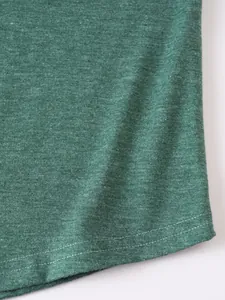 Close-up of green marl fabric and stitching detail on a men's sports hoodie