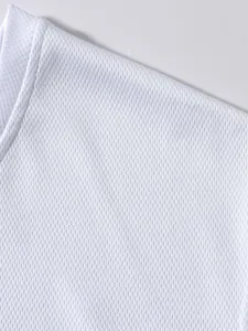 Close-up detail of breathable white mesh fabric on a men's sports tank top for running