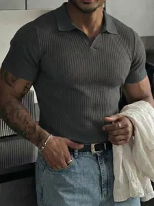 Detailed view of a men's grey ribbed knit polo shirt featuring a classic V-neck design