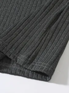 Close-up of the dark gray ribbed knit fabric texture and seam detail for men's tank top