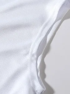 Close-up of white breathable mesh fabric and stitching on men's sports tank top
