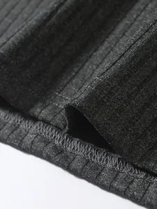 Close-up of dark grey ribbed fabric texture and hem stitching on men's tank top