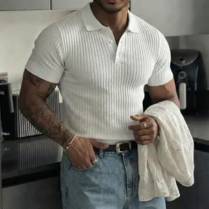 Detail view of a white ribbed knit short-sleeve polo shirt for men with buttons