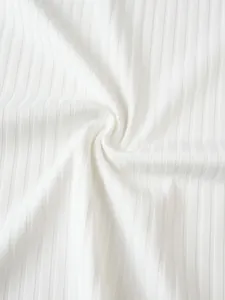 Close-up of white ribbed knit fabric texture for men's athletic tank top