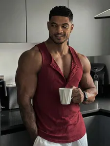 Detailed view of men's burgundy ribbed muscle tank top with button collar detail.