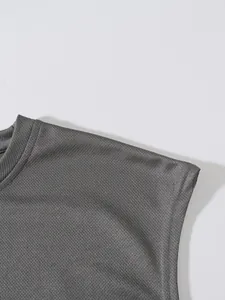 Close-up showing the breathable grey mesh fabric texture of a sports fitness tank top