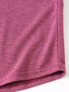 Macro detail showing the magenta knit fabric texture and hem stitching on men's hoodie
