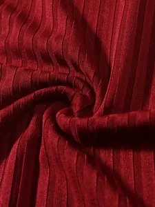 Detailed macro view of red ribbed knit fabric for men's summer athletic tank top