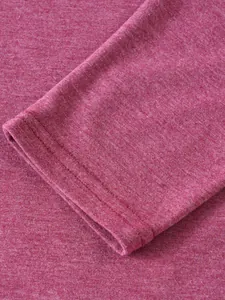 Close-up of pink outdoor sports hoodie cuff showing soft knitted fabric texture