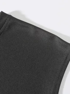 Close-up detail of the black breathable mesh fabric on this men's athletic tank top