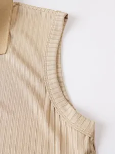Close-up detail showing the ribbed texture and collar of a khaki sleeveless polo shirt.