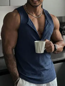 Premium men's blue ribbed fitness tank top featuring button neck detail on muscular model