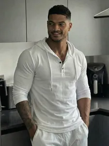 Men's white long-sleeve henley hoodie with button placket for casual lifestyle wear.