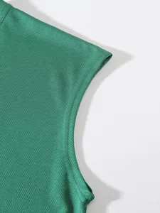 Macro detail view of the breathable green mesh fabric texture on this sports fitness vest