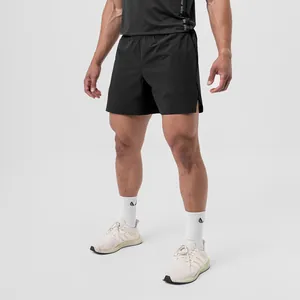 Close-up view of men's quick-dry athletic shorts with a minimalist black design