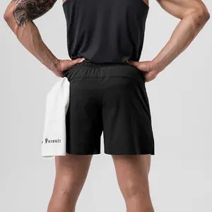 Rear view of black quick-dry sports shorts with a convenient towel loop detail