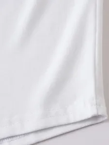 Detailed close-up of premium white knit fabric and neat stitching on a casual men's hoodie