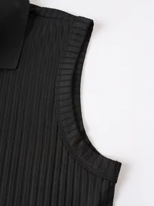 Close-up detail of black ribbed fabric on a men's sleeveless Polo shirt showing armhole