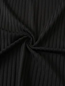 Close-up macro view of high-quality black ribbed knit fabric texture for men's tank top.