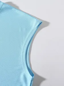 Close-up of light blue breathable mesh fabric detail for athletic sports tank top