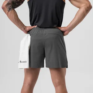Back detail of men's charcoal gym shorts with a functional towel loop for workouts.